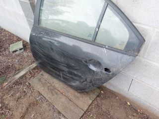 bontott NISSAN PRIMERA Bal hátsó Ajtó (Üres lemez)