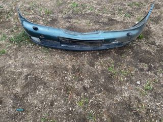 bontott NISSAN PRIMERA Első Lökhárító (Részeivel)