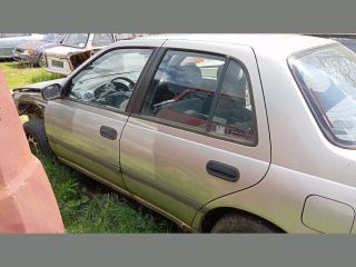 bontott NISSAN SUNNY Bal hátsó Ajtó (Üres lemez)
