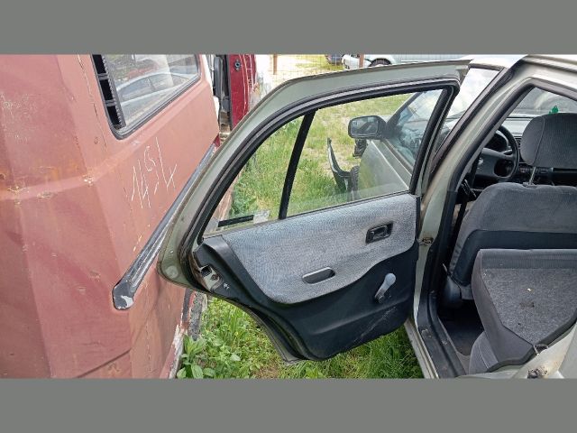 bontott NISSAN SUNNY Bal hátsó Ajtó (Üres lemez)