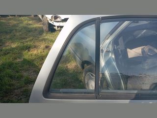 bontott NISSAN SUNNY Jobb hátsó Fixüveg (Ajtóban)