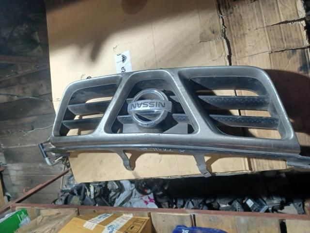 bontott NISSAN X-TRAIL I Első Lökhárító Alsó Középső Díszrács