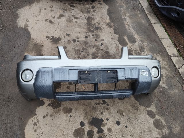 bontott NISSAN X-TRAIL I Első Lökhárító (Részeivel)