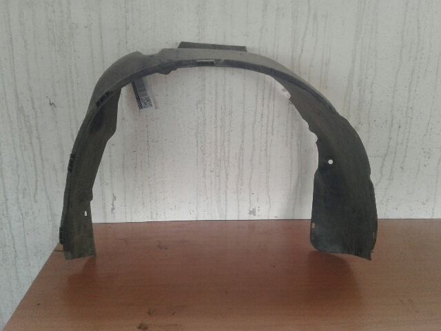 bontott OPEL ASTRA F Bal első Dobbetét (Kerékjárati, Műanyag)