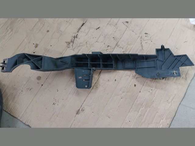 bontott OPEL ASTRA J Bal Fényszóró Tartó