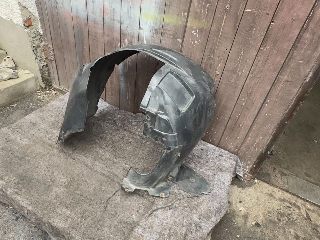 bontott OPEL COMBO Bal első Első Dobbetét (Kerékjárati, Műanyag)