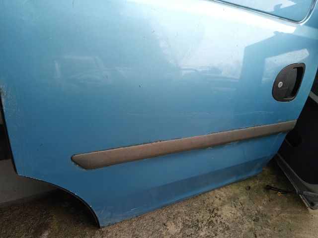 bontott OPEL COMBO Jobb Tolóajtó (Részeivel)