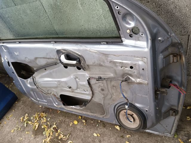 bontott OPEL CORSA C Bal első Ajtó (Részeivel)