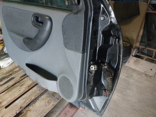 bontott OPEL CORSA C Bal első Ajtó (Részeivel)