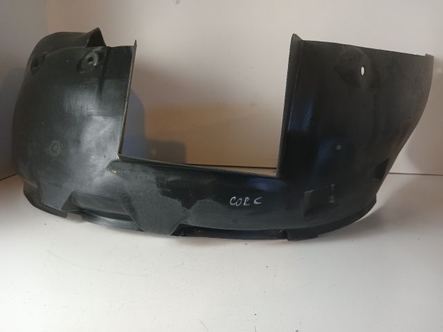 bontott OPEL CORSA C Bal első Dobbetét (Kerékjárati, Műanyag)