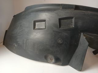 bontott OPEL CORSA C Bal első Dobbetét (Kerékjárati, Műanyag)