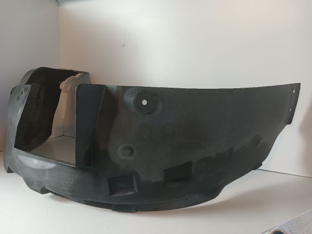 bontott OPEL CORSA C Bal első Dobbetét (Kerékjárati, Műanyag)