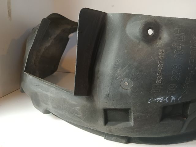 bontott OPEL CORSA C Bal első Dobbetét (Kerékjárati, Műanyag)