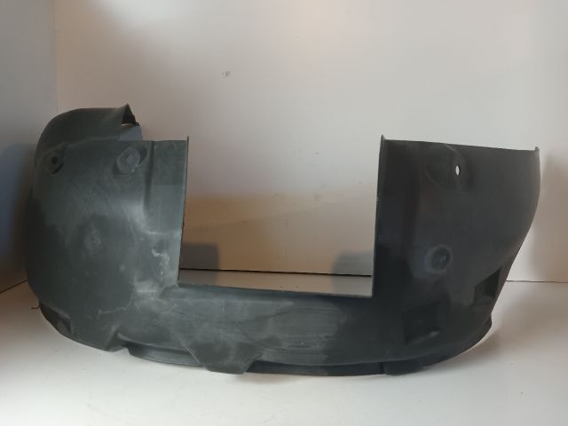 bontott OPEL CORSA C Bal első Dobbetét (Kerékjárati, Műanyag)