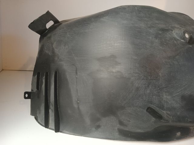 bontott OPEL CORSA C Bal első Dobbetét (Kerékjárati, Műanyag)