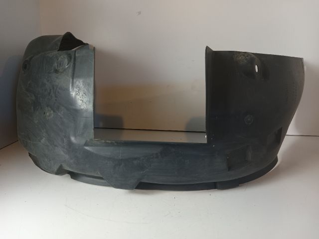 bontott OPEL CORSA C Bal első Dobbetét (Kerékjárati, Műanyag)