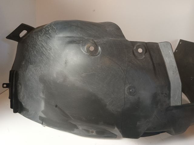 bontott OPEL CORSA C Bal első Dobbetét (Kerékjárati, Műanyag)