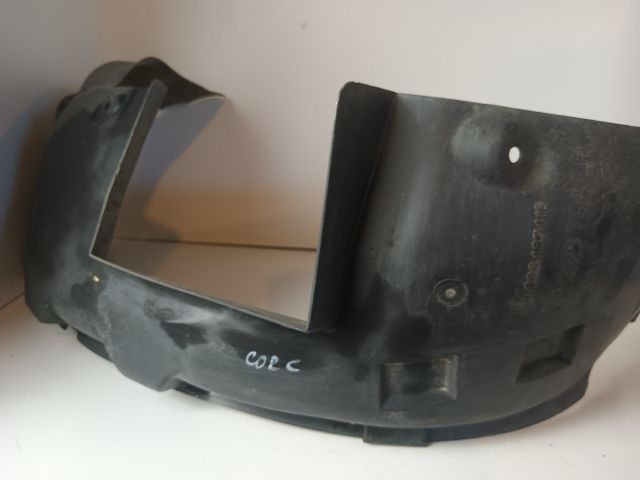 bontott OPEL CORSA C Bal első Dobbetét (Kerékjárati, Műanyag)