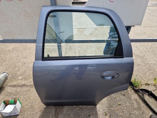 bontott OPEL CORSA C Bal hátsó Ajtó (Részeivel)