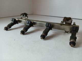 bontott OPEL CORSA D Porlasztó Sor / Híd