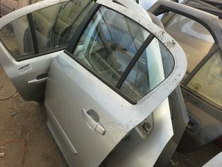 bontott OPEL CORSA D Bal hátsó Ajtó (Részeivel)