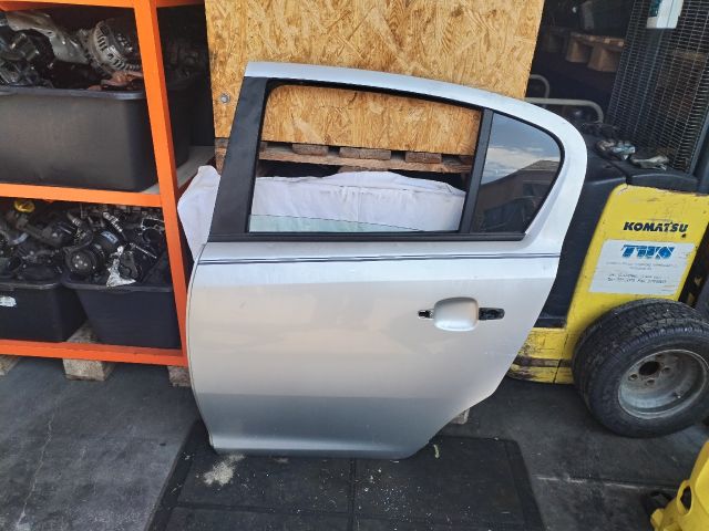 bontott OPEL CORSA D Bal hátsó Ajtó (Üres lemez)