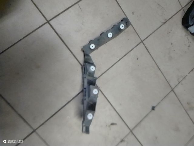 bontott OPEL CORSA D Bal hátsó Oldal Lökhárító Tartó (Műanyag)