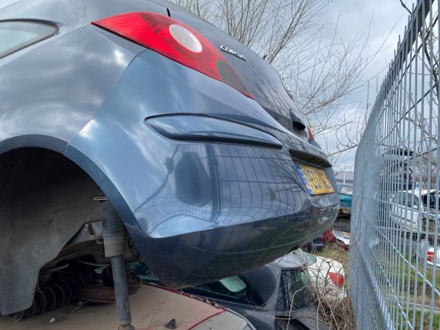 bontott OPEL CORSA D Hátsó Lökhárító (Részeivel)