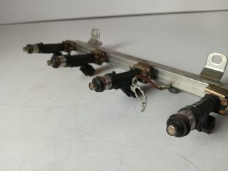 bontott OPEL CORSA E Porlasztó Sor / Híd