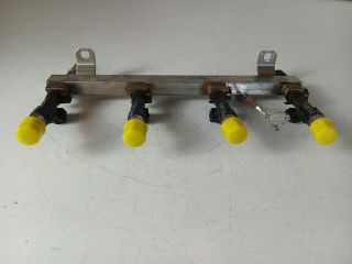 bontott OPEL CORSA E Porlasztó Sor / Híd