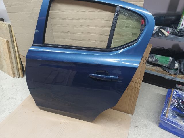 bontott OPEL CORSA E Bal hátsó Ajtó (Részeivel)