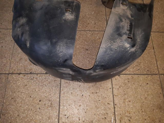 bontott OPEL CORSA E Bal hátsó Dobbetét (Kerékjárati, Műanyag)