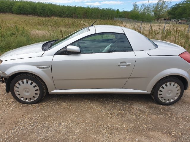 bontott OPEL TIGRA Bal hátsó Dobbetét (Kerékjárati, Műanyag)