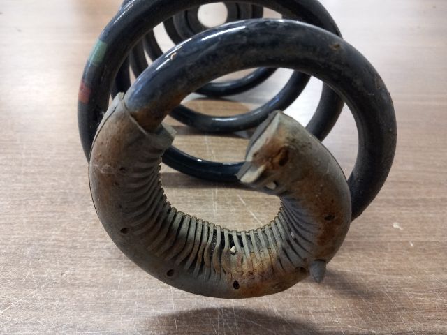 bontott RENAULT CLIO III Bal hátsó Rugó