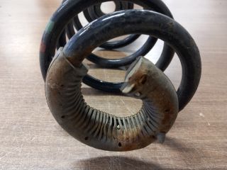 bontott RENAULT CLIO III Bal hátsó Rugó