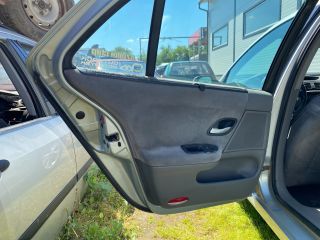 bontott RENAULT LAGUNA II Bal hátsó Ajtó (Részeivel)