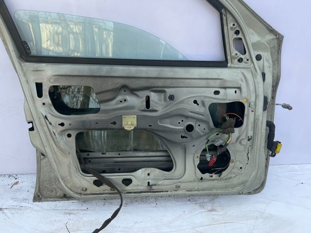 bontott RENAULT THALIA Bal első Ajtó (Üres lemez)