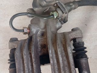 bontott SKODA OCTAVIA II Bal hátsó Féknyereg Munkahengerrel