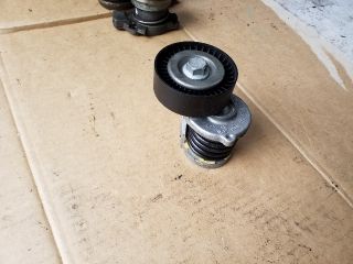 bontott SKODA OCTAVIA II Szíjfeszítő Görgő