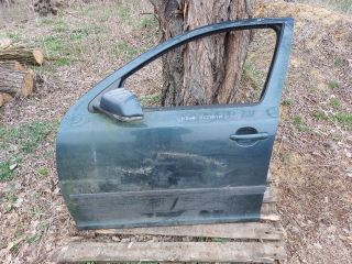 bontott SKODA OCTAVIA II Bal első Ajtó (Részeivel)