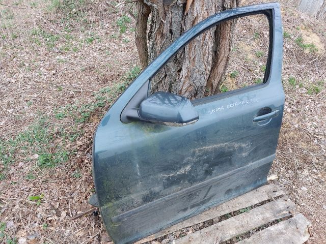 bontott SKODA OCTAVIA II Bal első Ajtó (Részeivel)