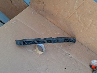 bontott SKODA OCTAVIA II Bal első Lökhárító Tartó (Műanyag)