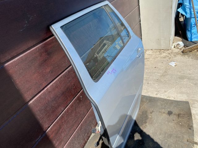 bontott SKODA OCTAVIA II Bal hátsó Ajtó (Részeivel)