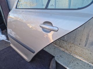 bontott SKODA OCTAVIA II Bal hátsó Ajtó (Részeivel)