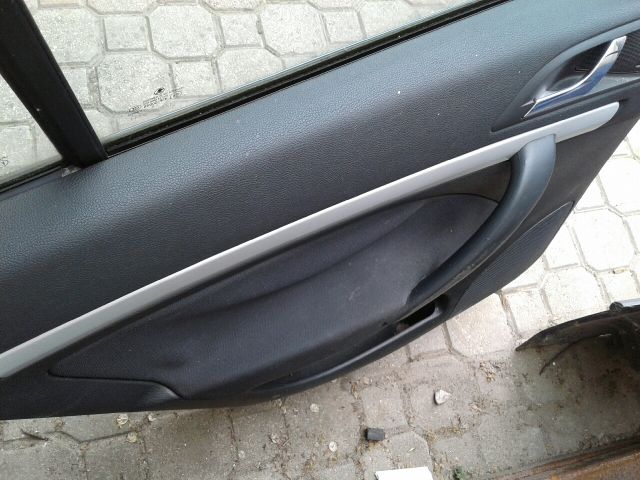 bontott SKODA OCTAVIA II Bal hátsó Ajtó (Részeivel)