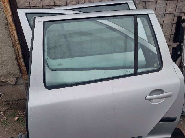 bontott SKODA OCTAVIA II Bal hátsó Ajtó (Részeivel)