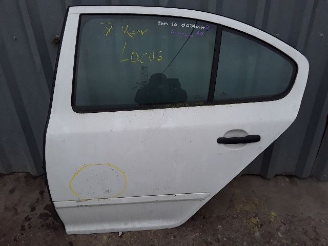 bontott SKODA OCTAVIA II Bal hátsó Ajtózár