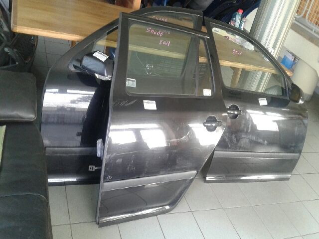 bontott SKODA OCTAVIA II Bal hátsó Ajtózár