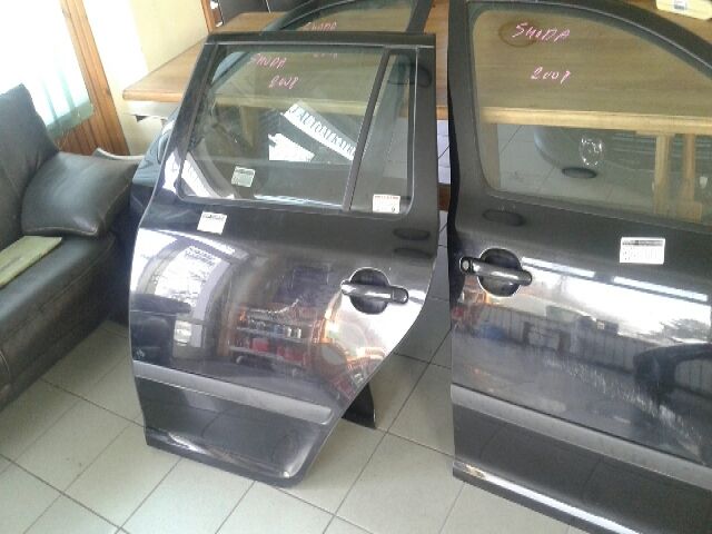 bontott SKODA OCTAVIA II Bal hátsó Fixüveg (Ajtóban)