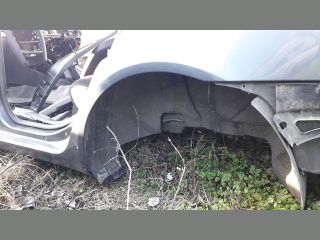 bontott SKODA OCTAVIA II Bal hátsó Sárvédő
